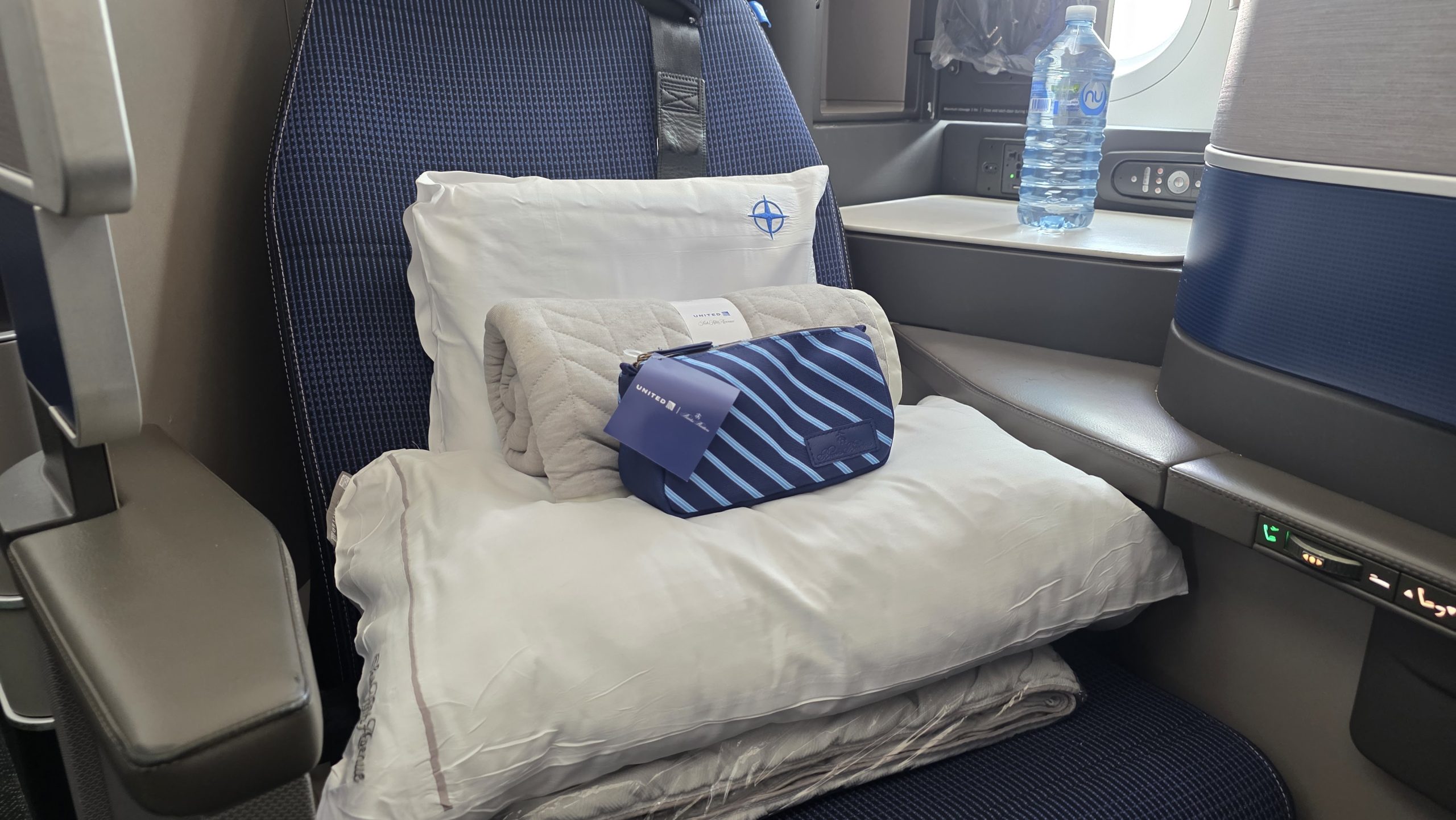 United Airlines seat pillow amenity kit