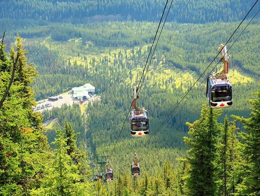 Emerlad landf tour in Banff Canada. Gondolas going up the mountain.